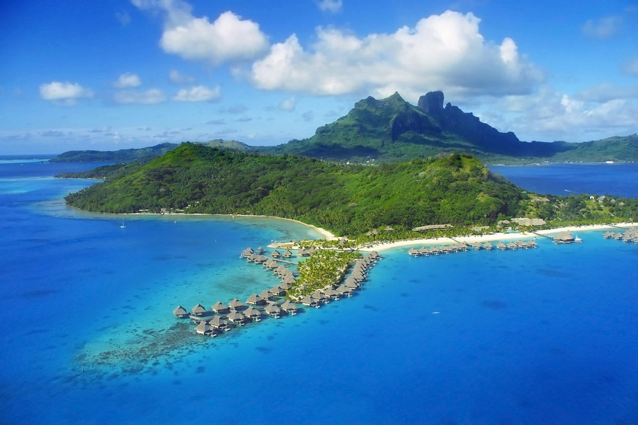 Aerial view of overwater bungalows in Bora Bora